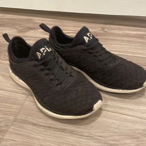 Black knit APL sneakers. Size 9